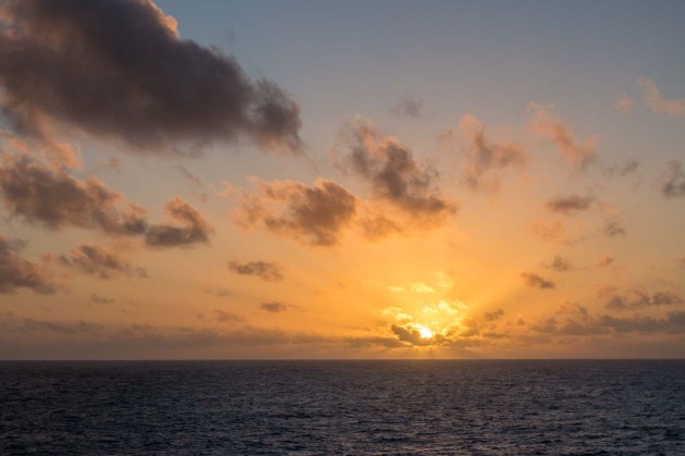 First sunset on the bow of the World Odyssey
